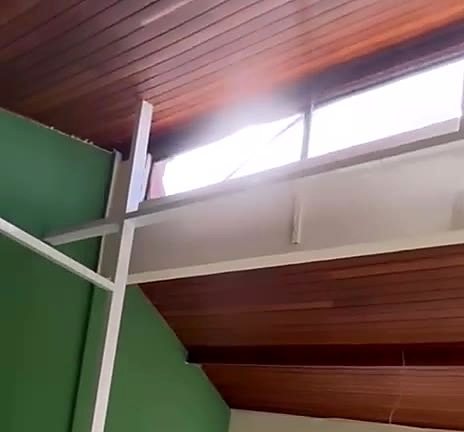 Verde Áurea no mezanino VIP — paleta da marca instalada